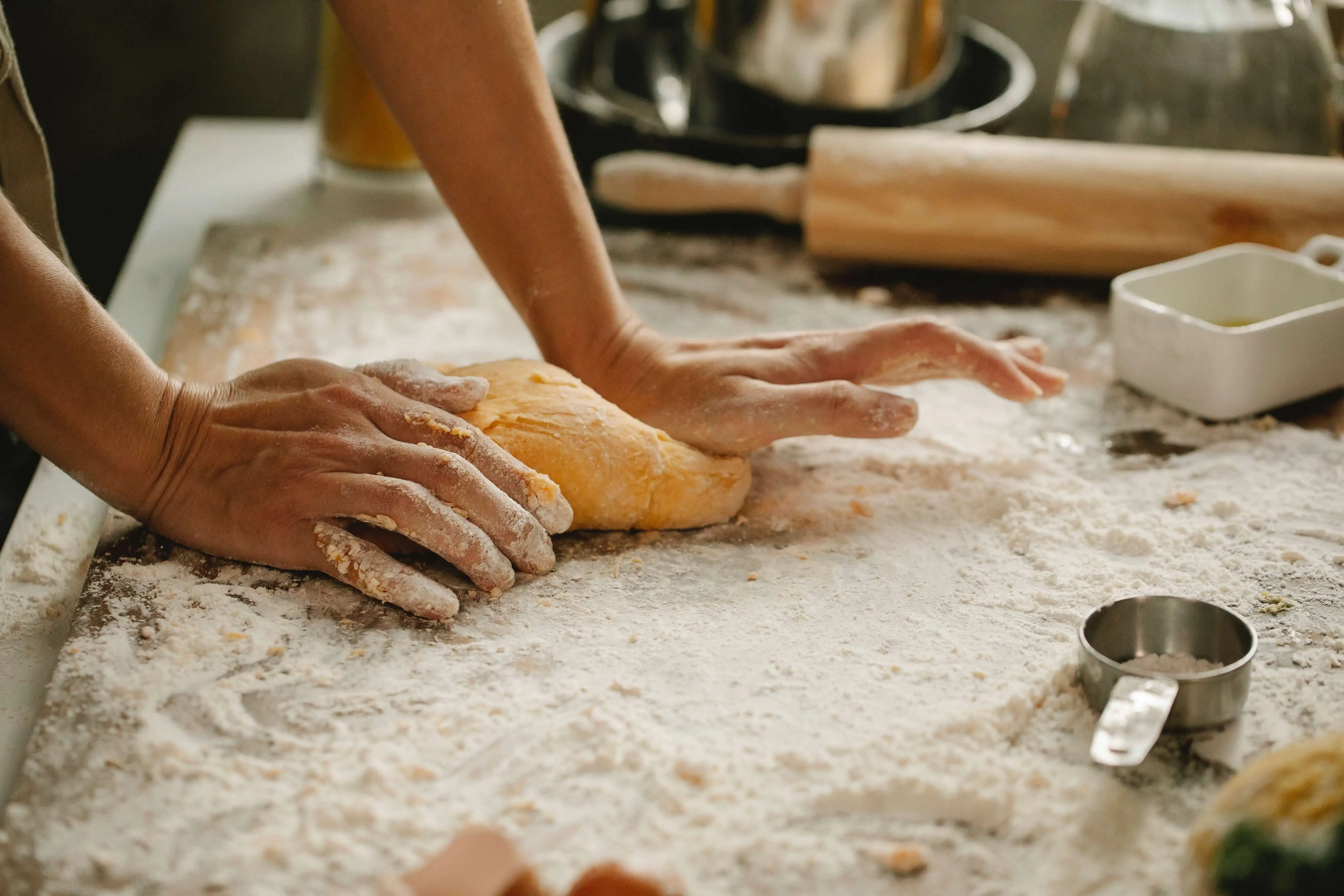 Baker making dough